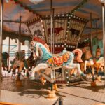 white and blue horse carousel